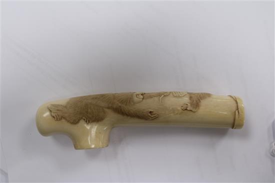 A Japanese ivory cane handle